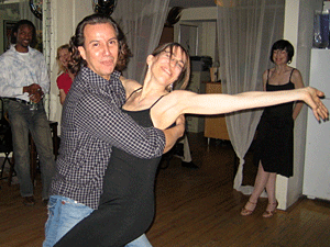 Liz Peterson and studio co-owner Tony Meridith dance up a storm at Liz's benefit birthday celebration in March.