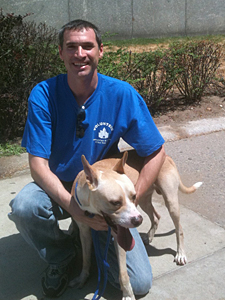 Dale Musselman, shown here with Ace, is one of the dedicated volunteers who help Animal Care & Control of NYC (AC&C) provide its services and programs throughout all five boroughs of New York City. (Photo by AC&C)